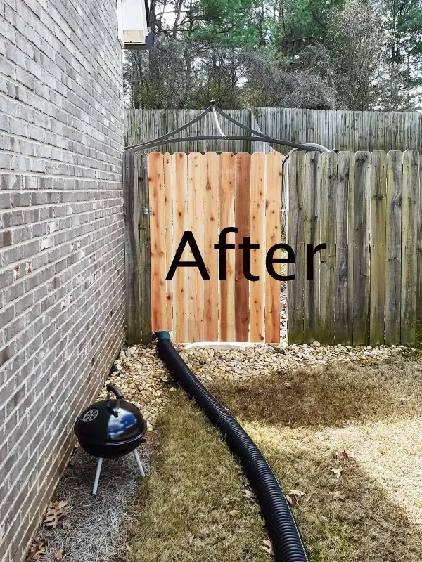 New wooden fence gate installed